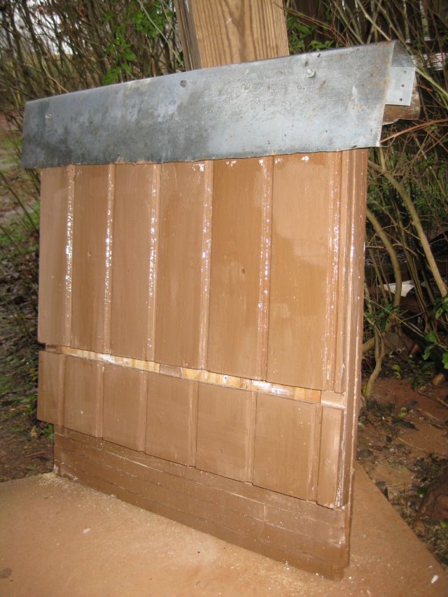 bat house with roofing material
