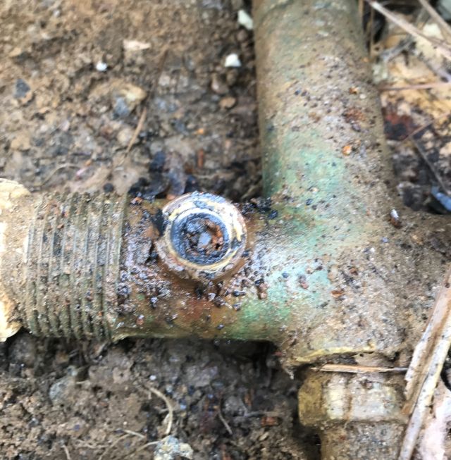 some rusted pipe remaining in whole after unscrewing the nipple